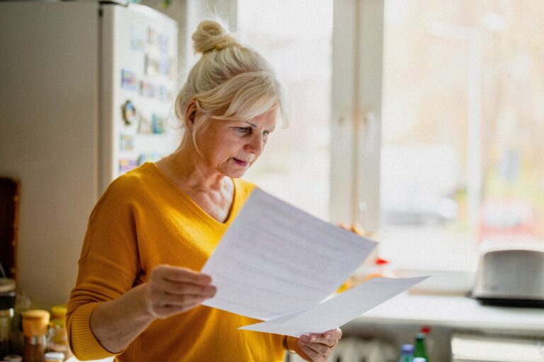 woman looking at paperwork