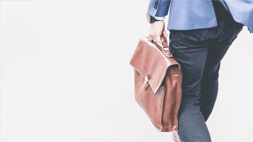 person with leather briefcase