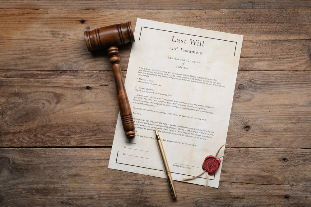 Last Will and Testament document with a gavel and pen on a wooden table representing will contests in California probate